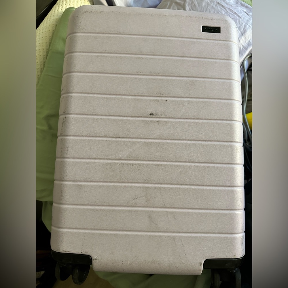 Away larger carryon. Used. Lavender.